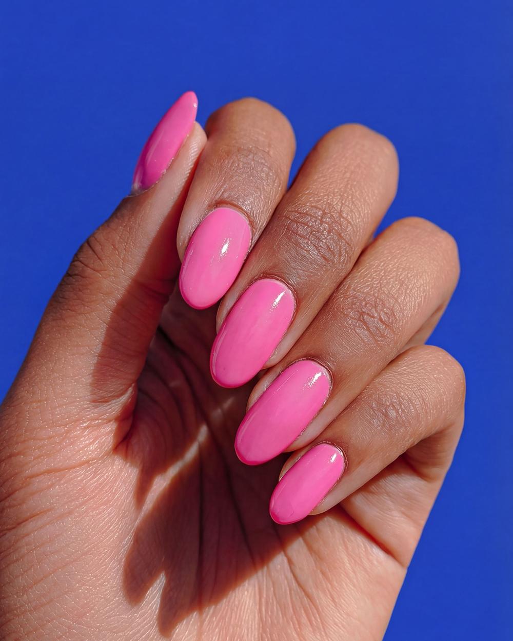 Pink nails, blue background