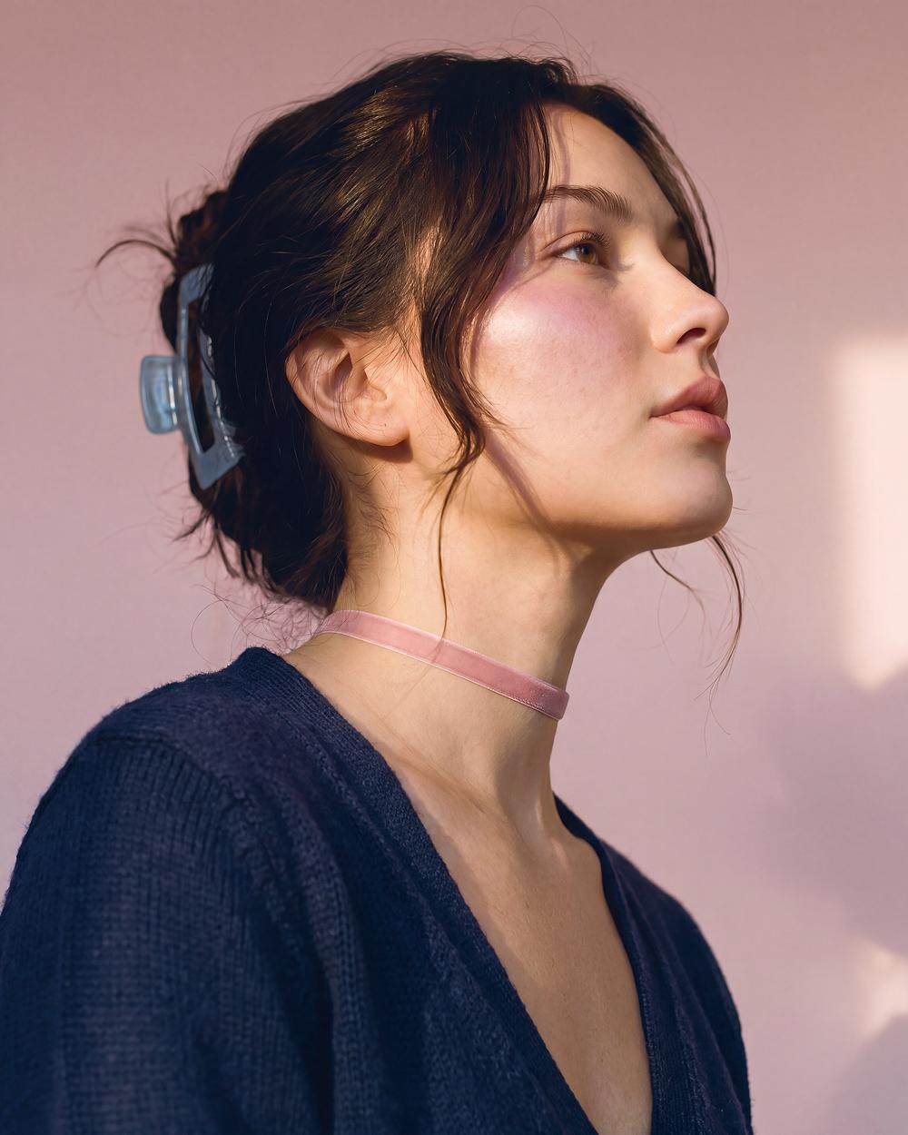 Profile, hair clip, navy cardigan